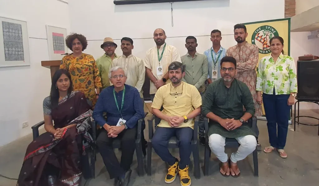 Art exhibition organized to help poor patients suffering from spinal pain.